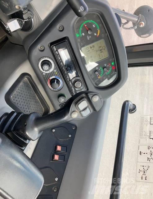 New Holland W70c Naudoti ratiniai krautuvai