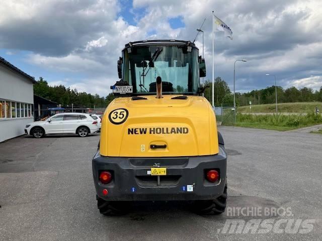 New Holland W70c Naudoti ratiniai krautuvai