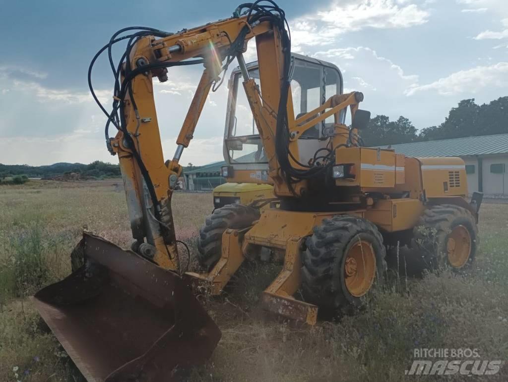 Mecalac 11 CX Ratiniai ekskavatoriai