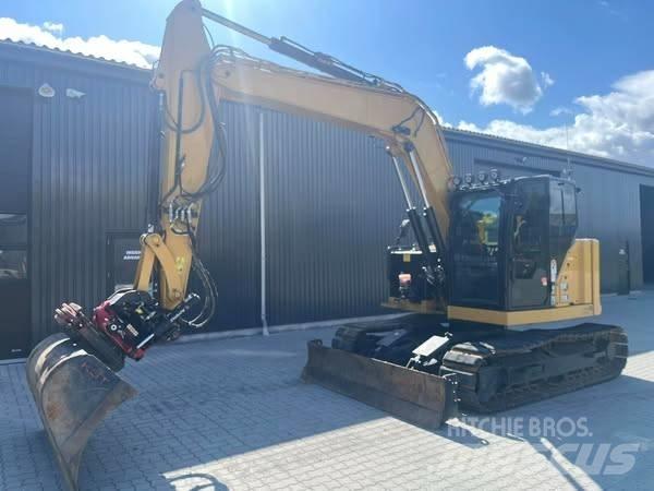 CAT 310 Vikšriniai ekskavatoriai