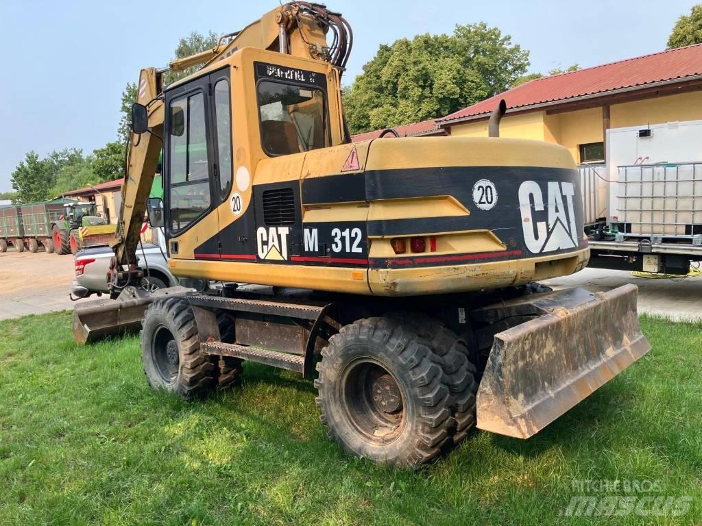 CAT M 312 Ratiniai ekskavatoriai