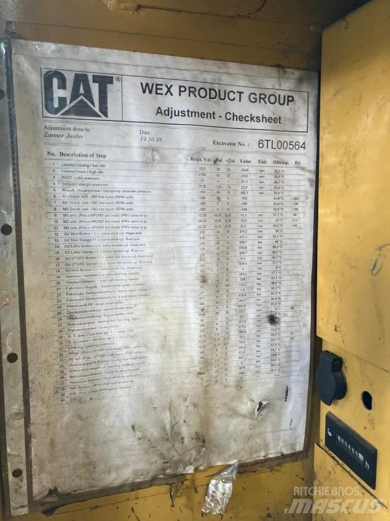 CAT M 312 Ratiniai ekskavatoriai