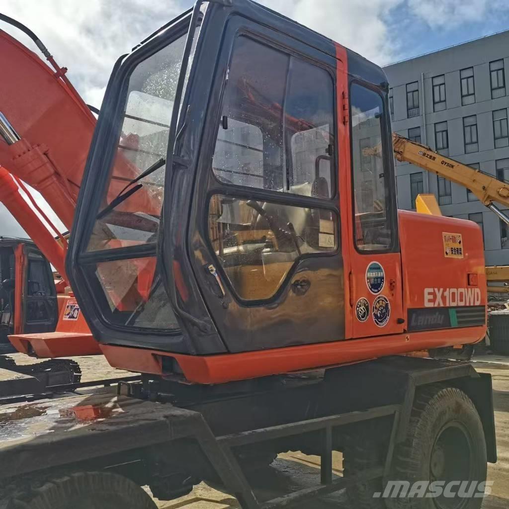 Hitachi EX 100 W D Ratiniai ekskavatoriai