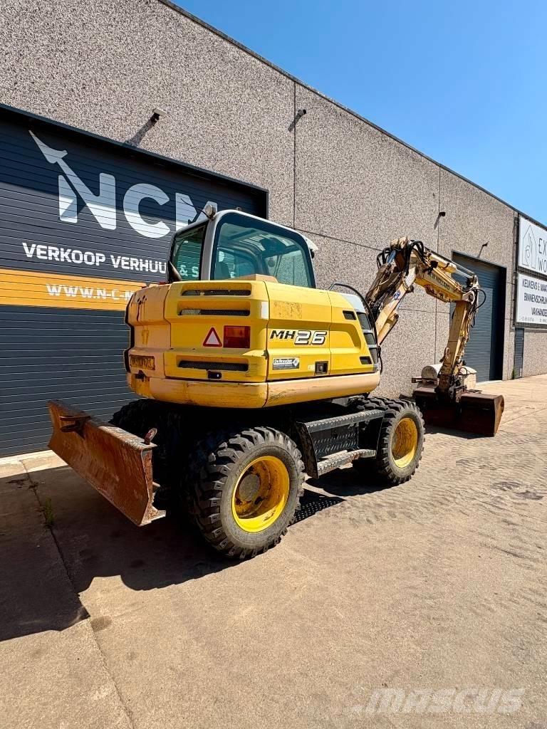 New Holland MH 2.6 Ratiniai ekskavatoriai
