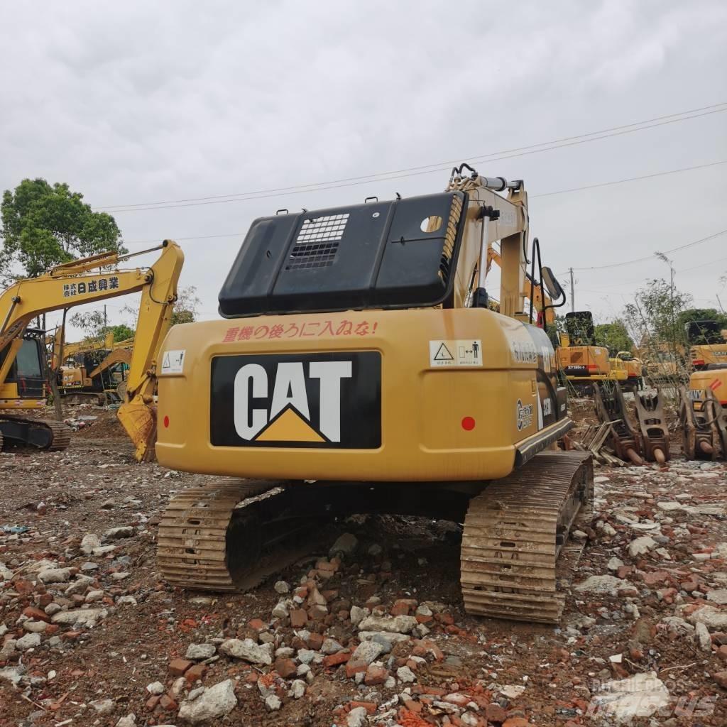 CAT 323DL Vikšriniai ekskavatoriai