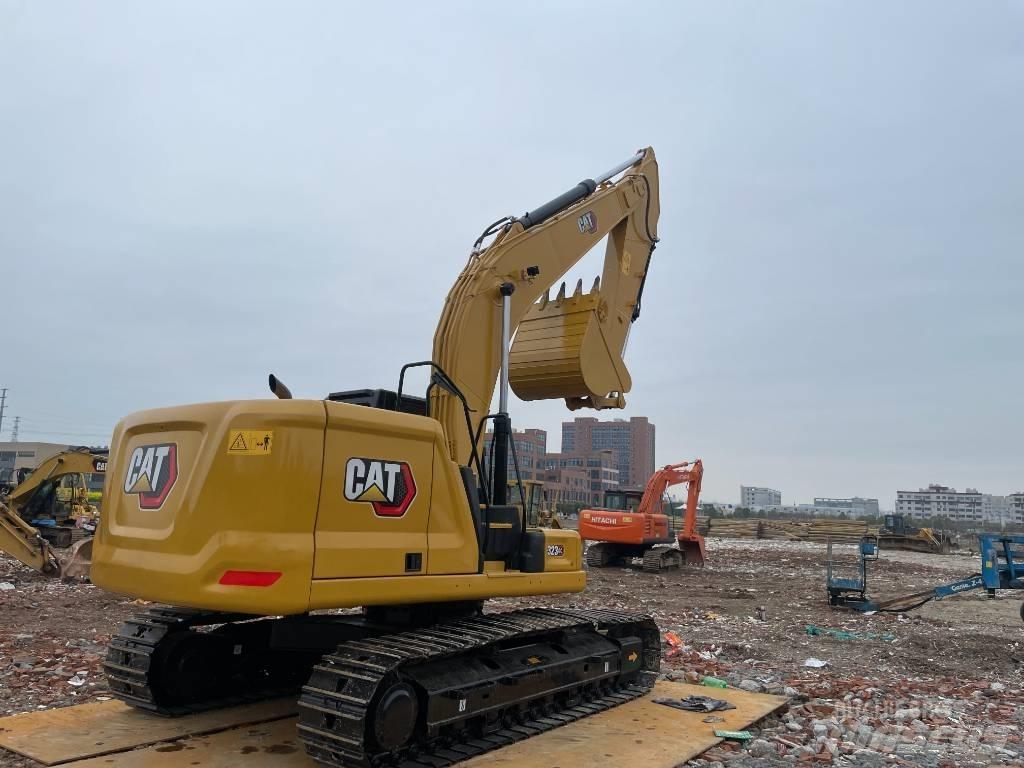 CAT 323GC Vikšriniai ekskavatoriai