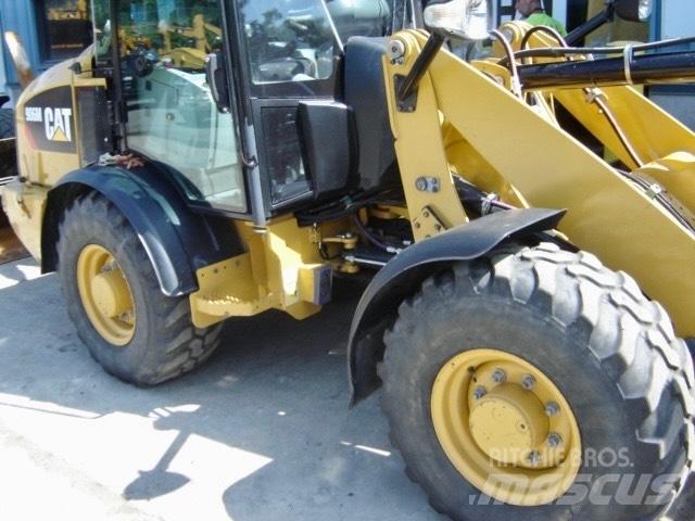 CAT 908 M Naudoti ratiniai krautuvai