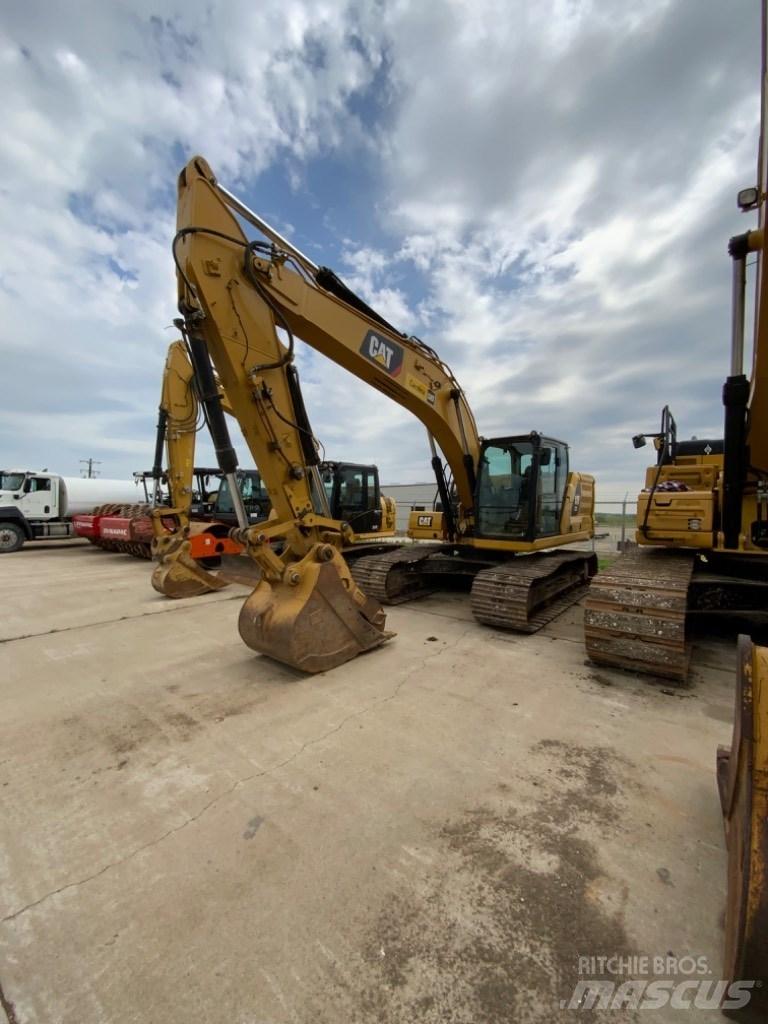 CAT 323 Vikšriniai ekskavatoriai