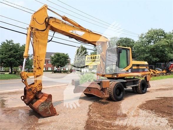 CAT M320 Ratiniai ekskavatoriai