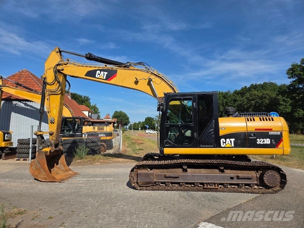 CAT 323DL Vikšriniai ekskavatoriai