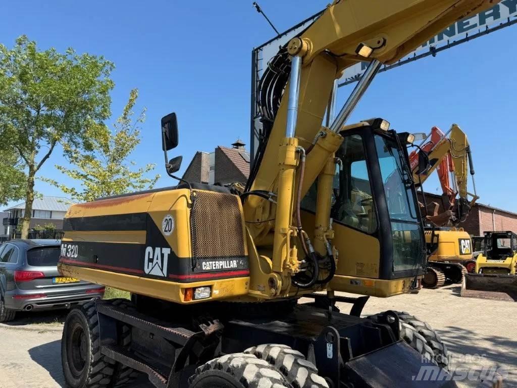 CAT M320 2001 Ratiniai ekskavatoriai