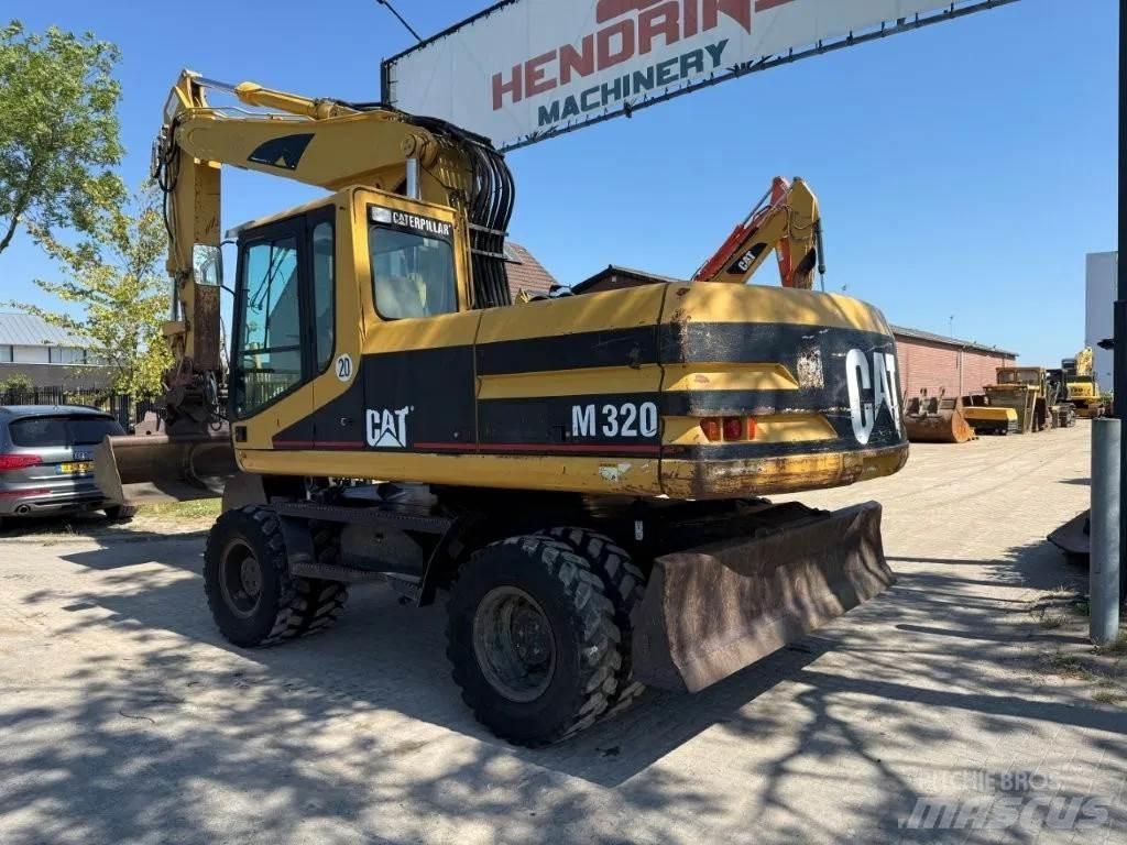 CAT M320 2001 Ratiniai ekskavatoriai