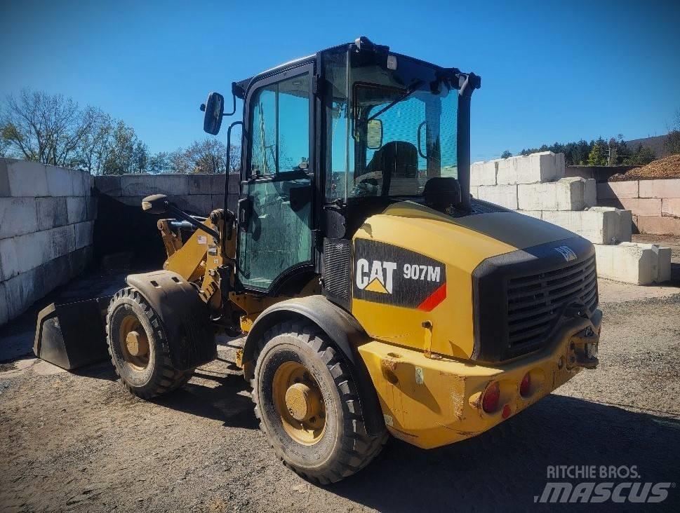 CAT 907 M Naudoti ratiniai krautuvai
