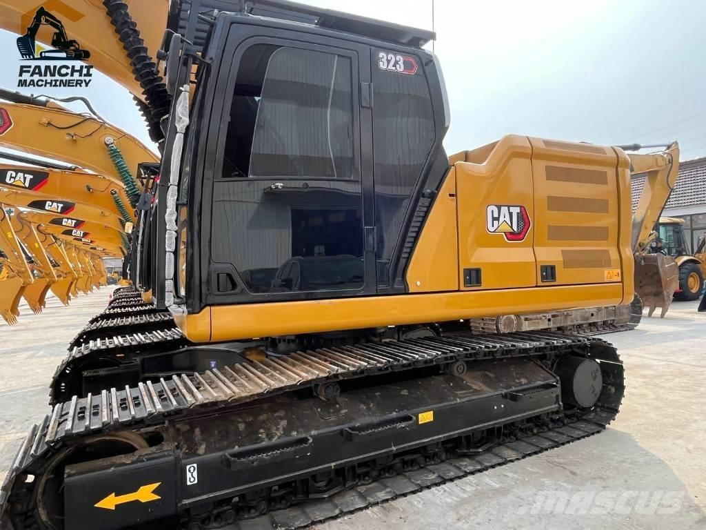 CAT 323 Vikšriniai ekskavatoriai