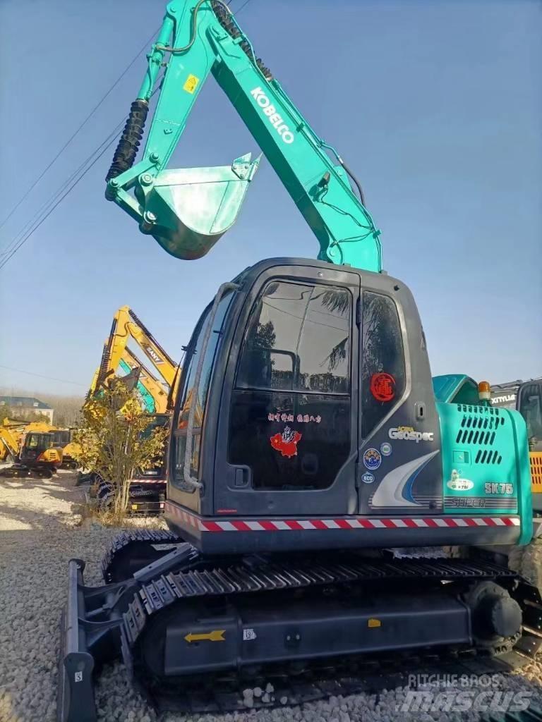 Kobelco SK 75 Vidutinės galios ekskavatoriai 7-12 t