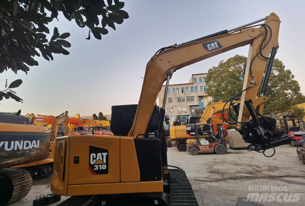 CAT 310 Vikšriniai ekskavatoriai