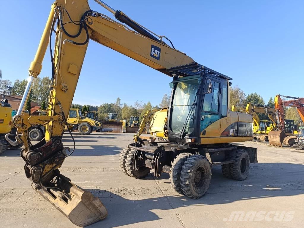 CAT M 318 C Ratiniai ekskavatoriai