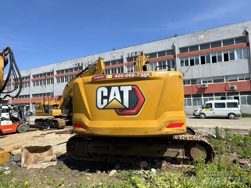 CAT 323GC Vikšriniai ekskavatoriai