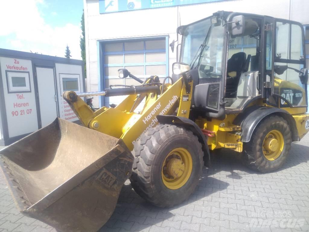 CAT 907 H Naudoti ratiniai krautuvai