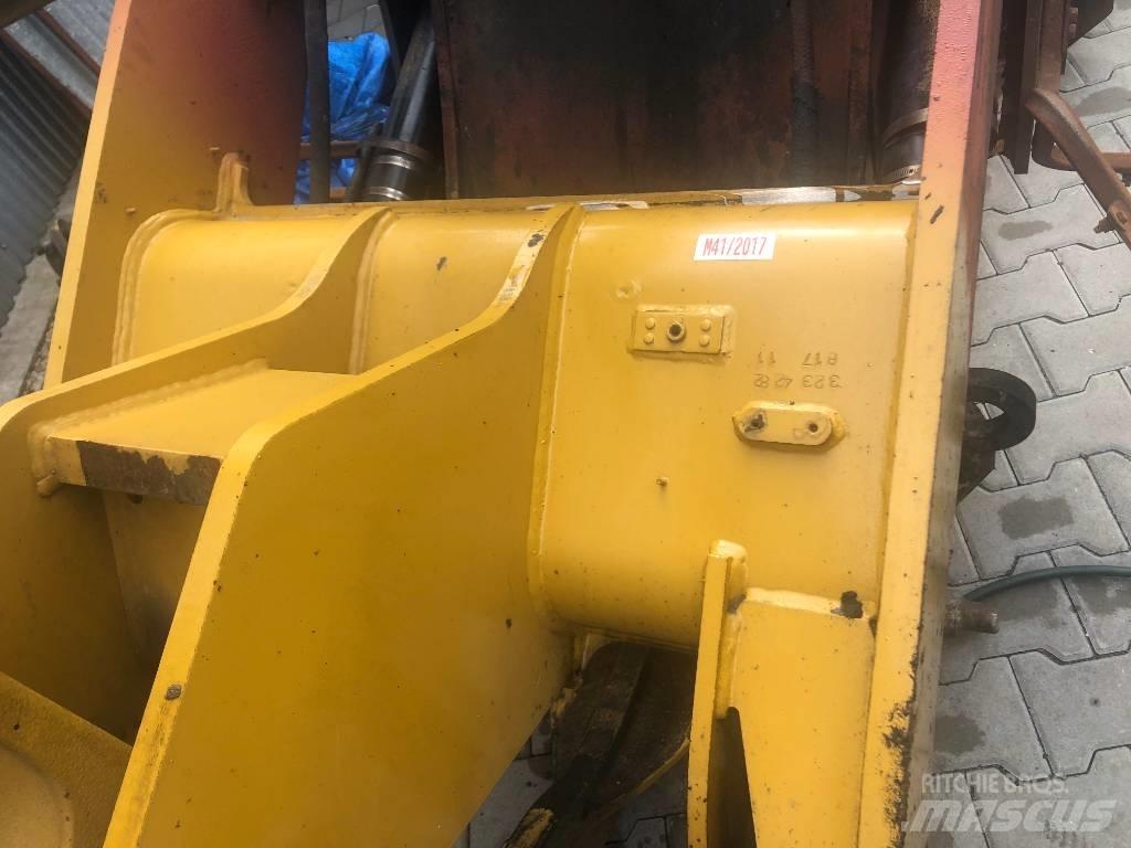 CAT 906 ramiona Važiuoklė ir suspensija