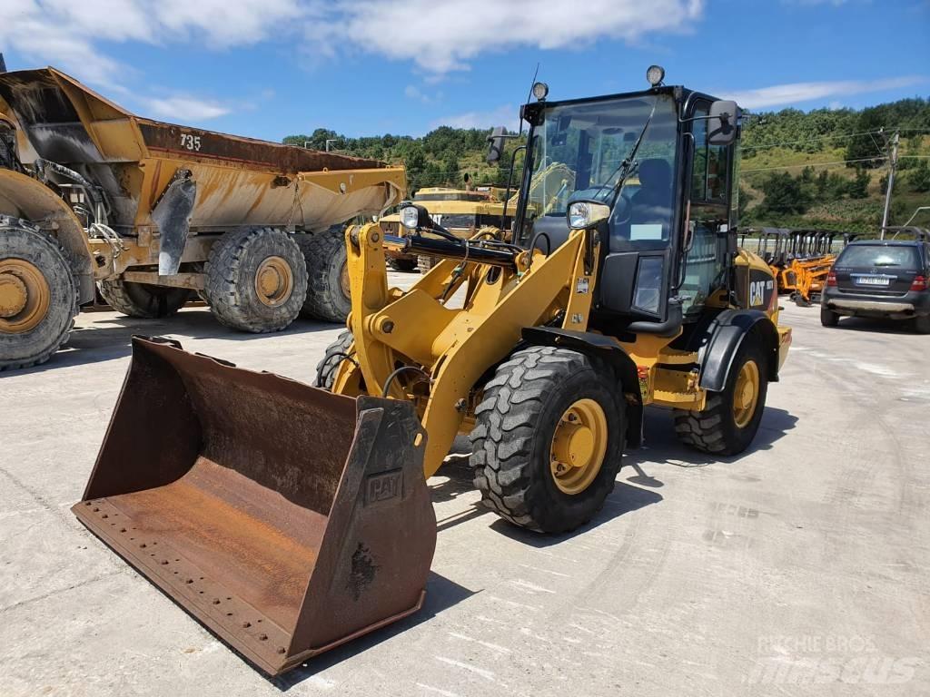 CAT 907 H Naudoti ratiniai krautuvai