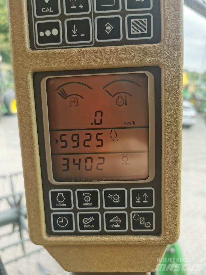 John Deere T560 Derliaus nuėmimo kombainai