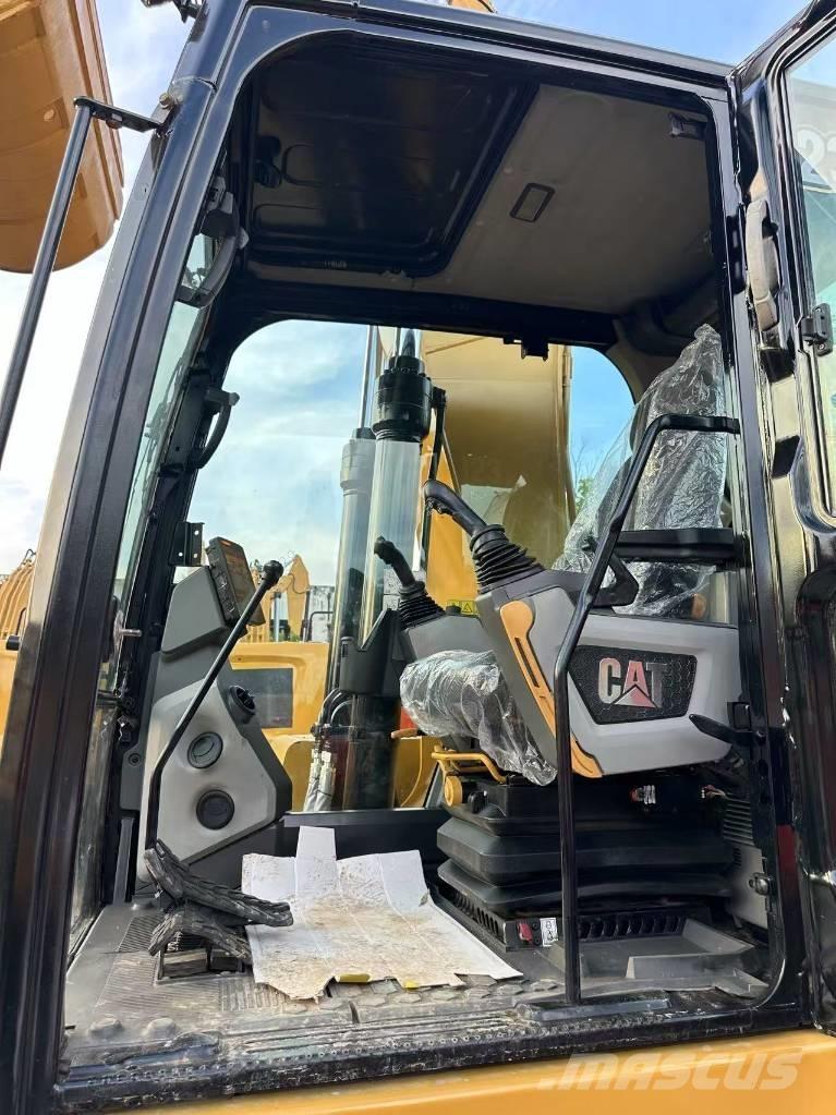 CAT 323 Vikšriniai ekskavatoriai