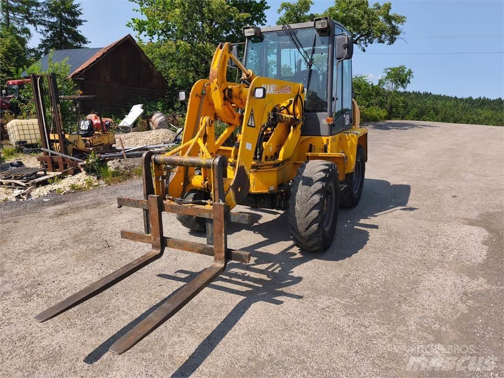 Ahlmann H883 Statyba - Kita