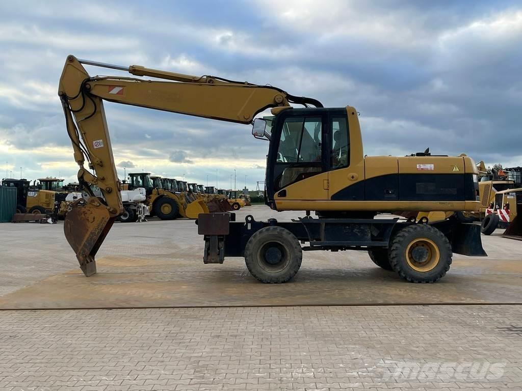 CAT M318C Ratiniai ekskavatoriai