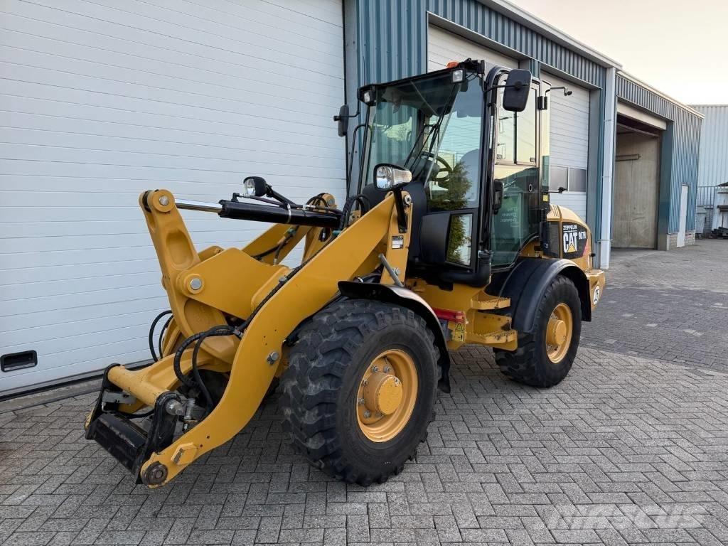 CAT 907 H Naudoti ratiniai krautuvai