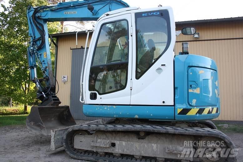  New Hollan E 70 BSR Vidutinės galios ekskavatoriai 7-12 t