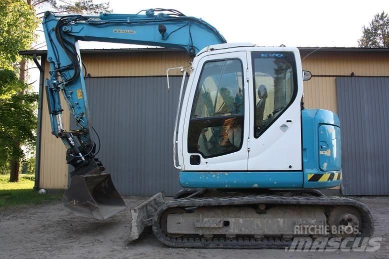  New Hollan E 70 BSR Vidutinės galios ekskavatoriai 7-12 t