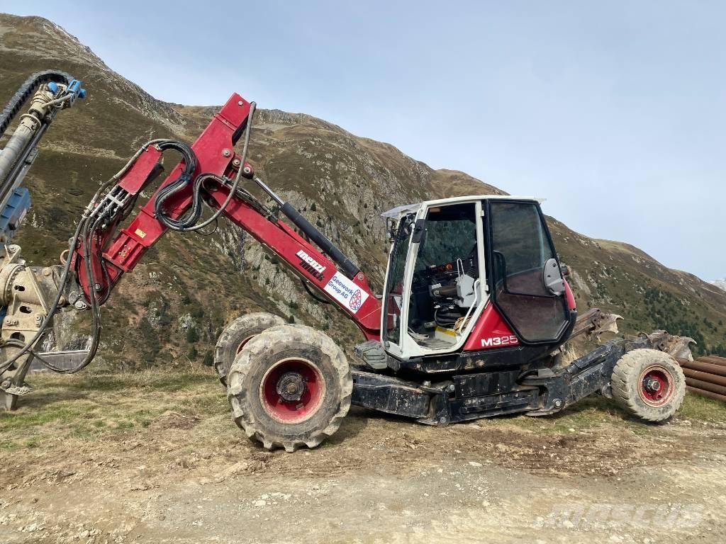 Menzi Muck 325 Ratiniai ekskavatoriai