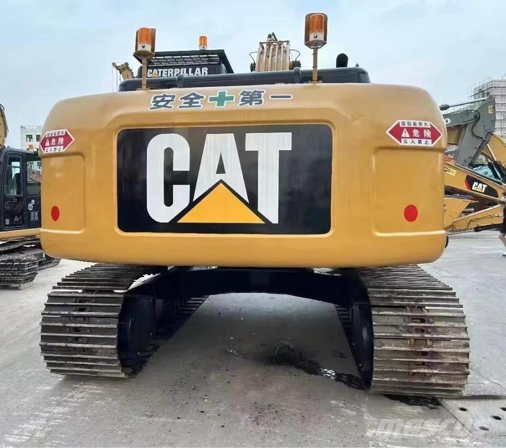 CAT 323 D Vikšriniai ekskavatoriai