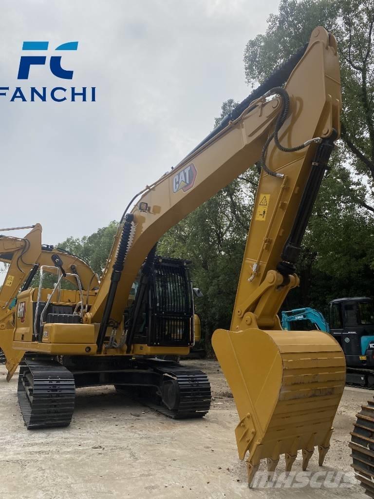 CAT 323 Vikšriniai ekskavatoriai