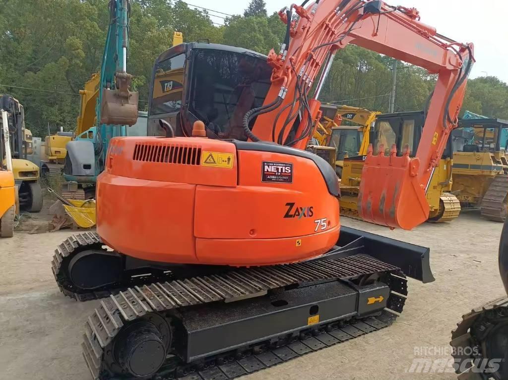 Hitachi ZX 75 Vidutinės galios ekskavatoriai 7-12 t