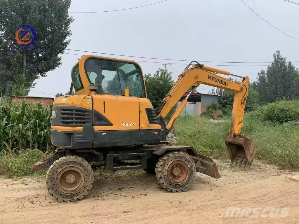 Hyundai 60 W Ratiniai ekskavatoriai