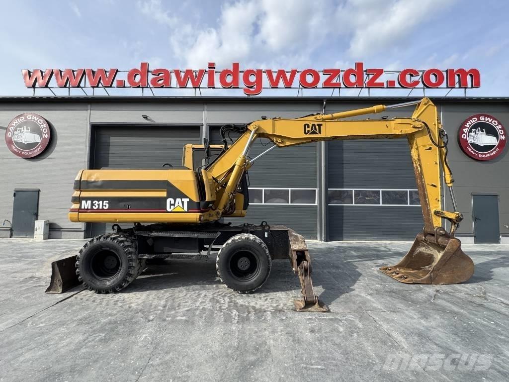CAT M 315 Ratiniai ekskavatoriai