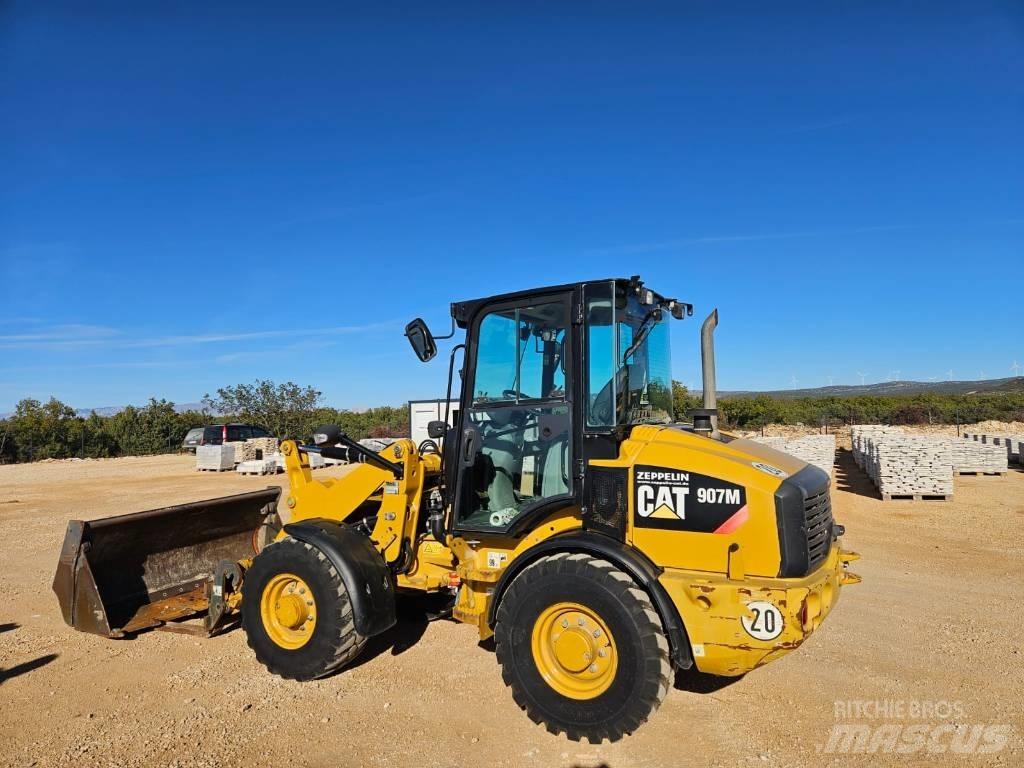 CAT 907 M Naudoti ratiniai krautuvai