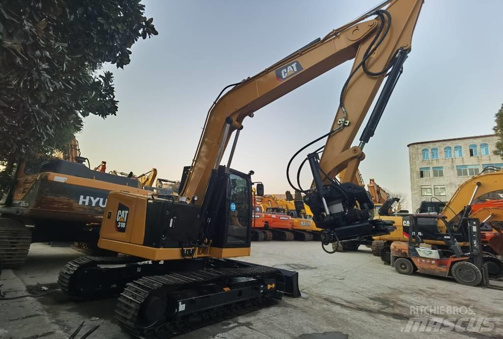 CAT 310 Vikšriniai ekskavatoriai