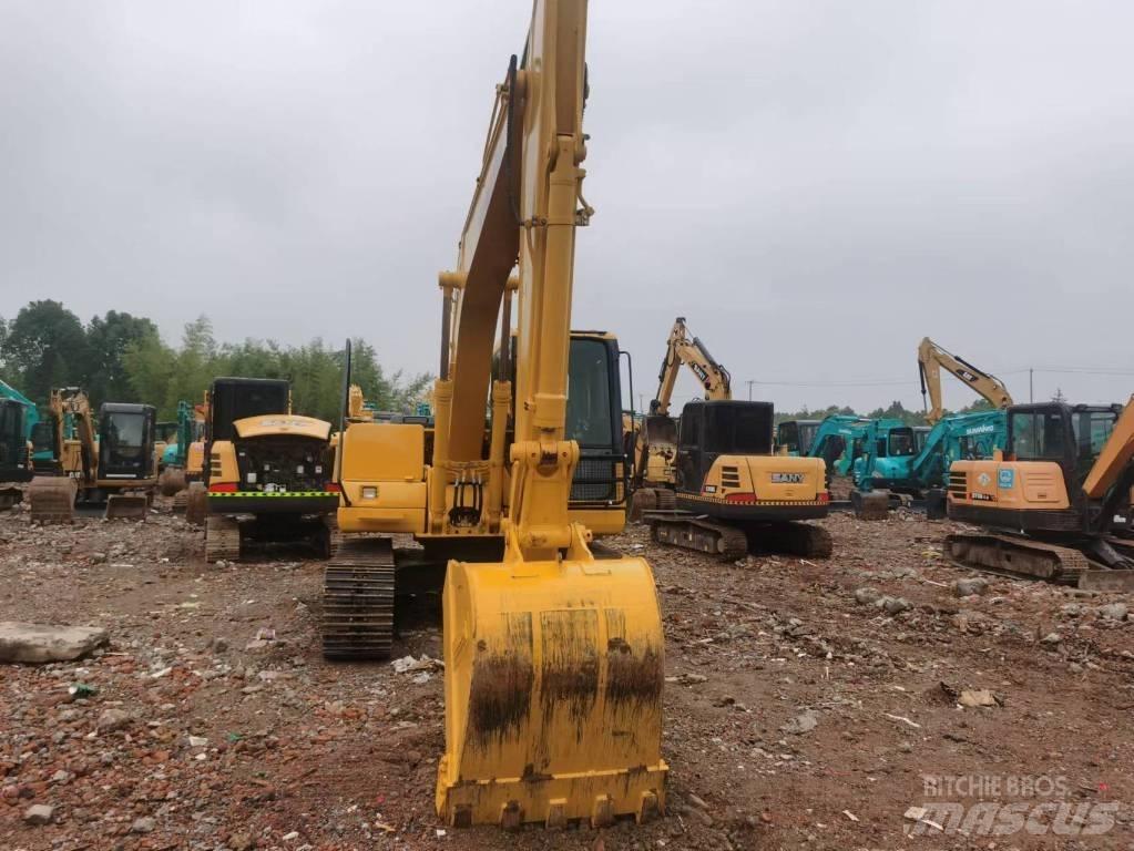 Komatsu PC 130 Vidutinės galios ekskavatoriai 7-12 t