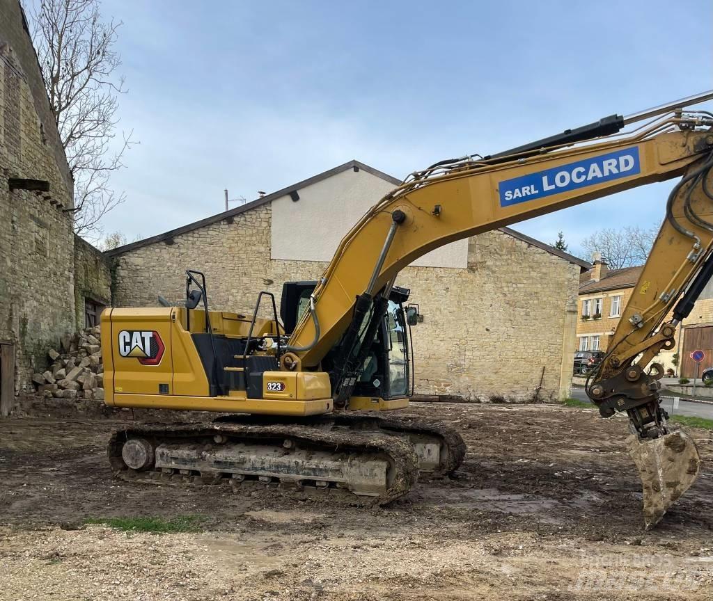 CAT 323 Vikšriniai ekskavatoriai