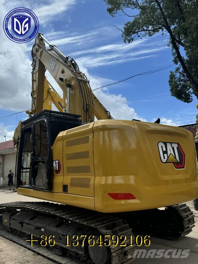 CAT 323 Vikšriniai ekskavatoriai
