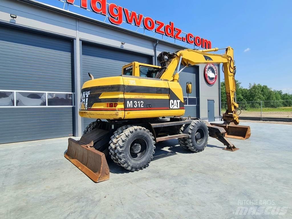 CAT M 312 Ratiniai ekskavatoriai