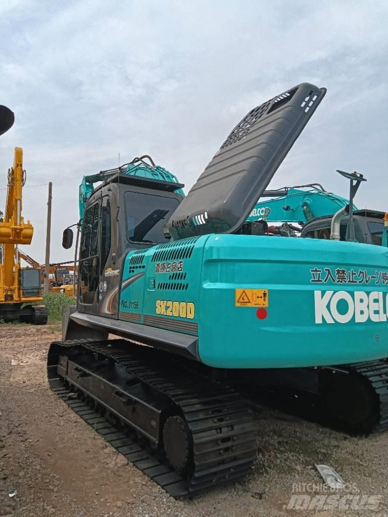 Kobelco SK 200D Vidutinės galios ekskavatoriai 7-12 t