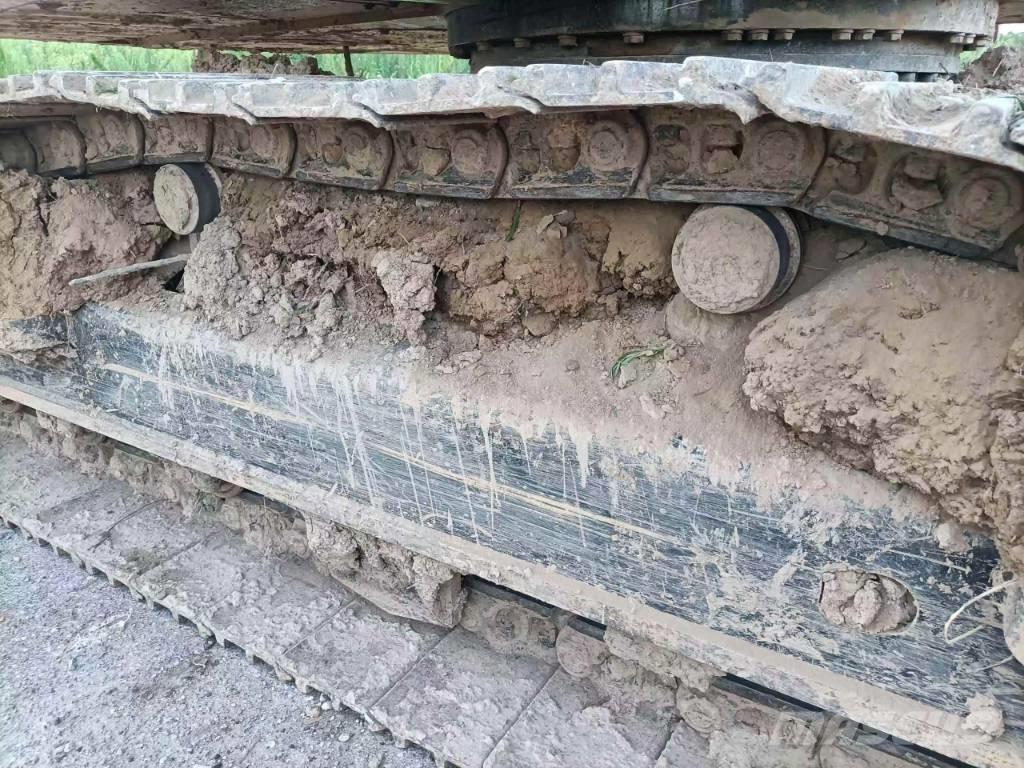 CAT 323GX Amfibiniai ekskavatoriai