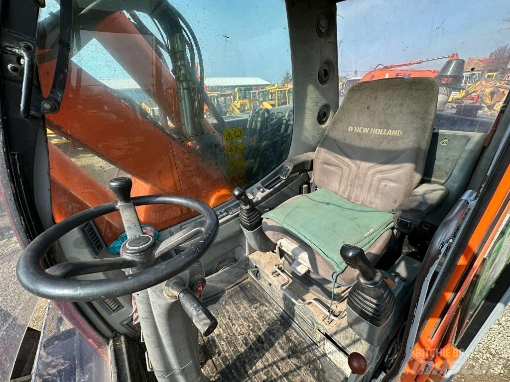New Holland MH Plus Ratiniai ekskavatoriai