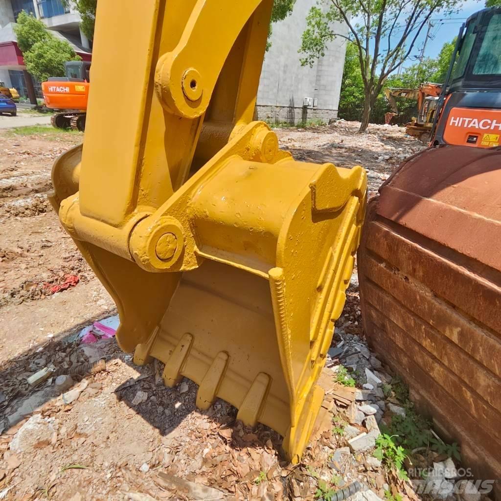 CAT 310 Vikšriniai ekskavatoriai
