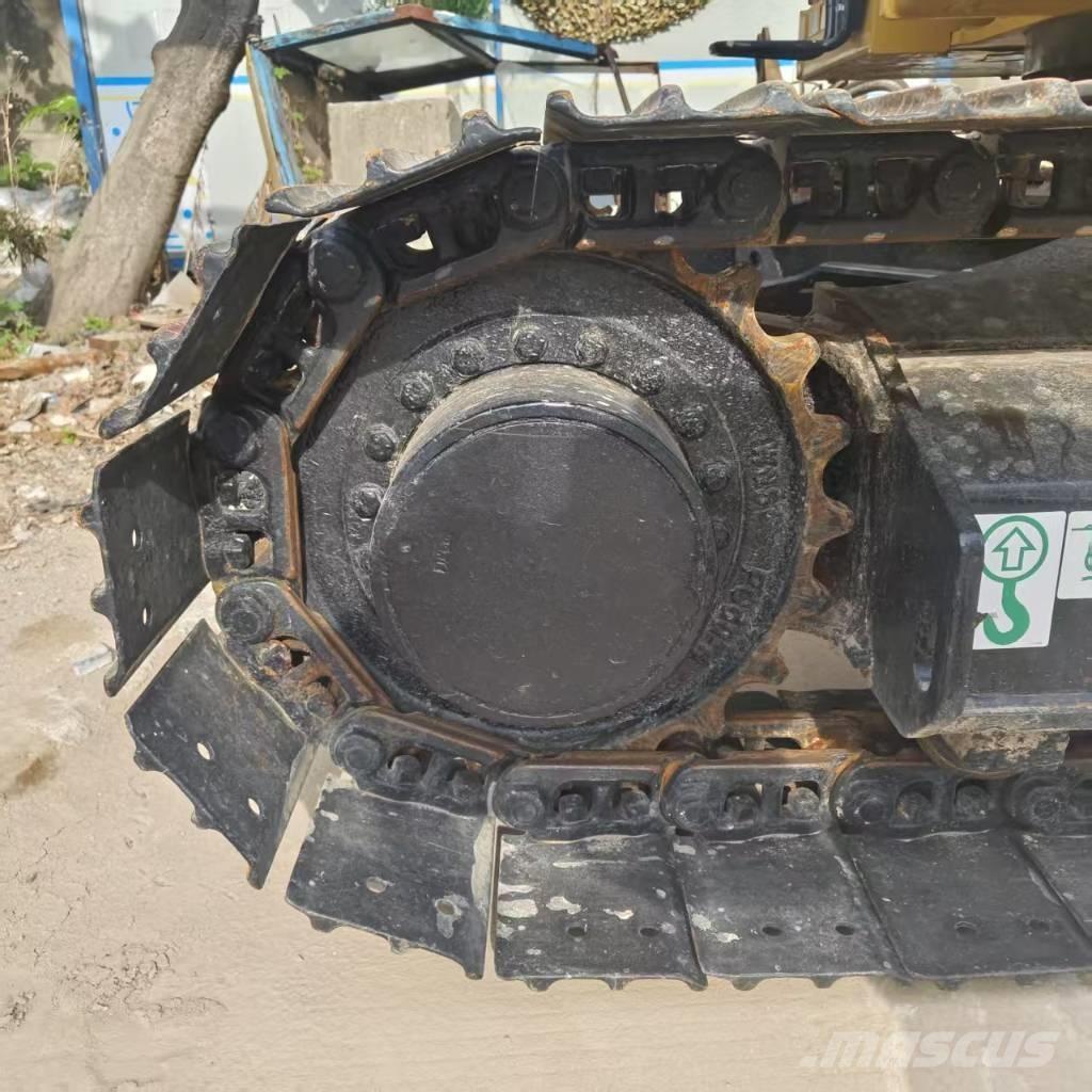 CAT 310 Vikšriniai ekskavatoriai