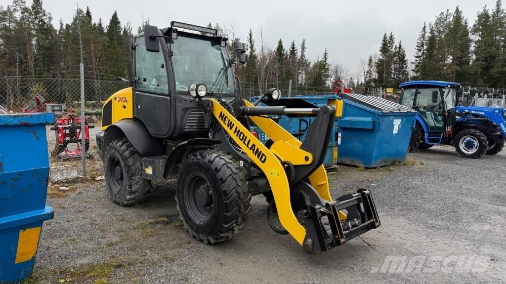 New Holland W70C Naudoti ratiniai krautuvai